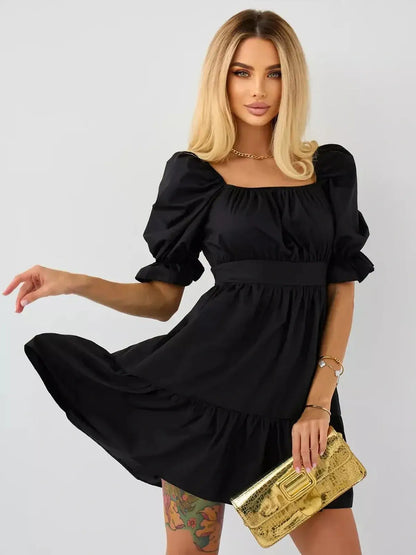 Elegant black mini dress with puff sleeves and square neckline, perfect for weddings and summer events.