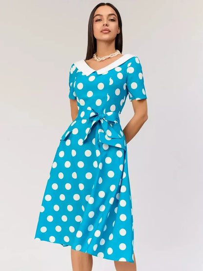 Retro Charm Midi Dress in turquoise with white polka dots and contrast collar, perfect for summer events and stylish occasions.