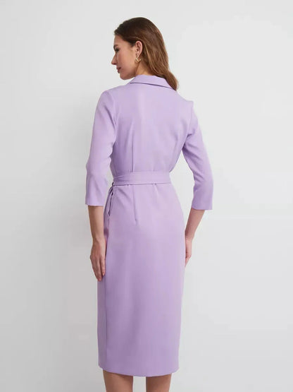 Back view of the Lilac Grace Midi Dress featuring a tailored silhouette and elegant wrap design.