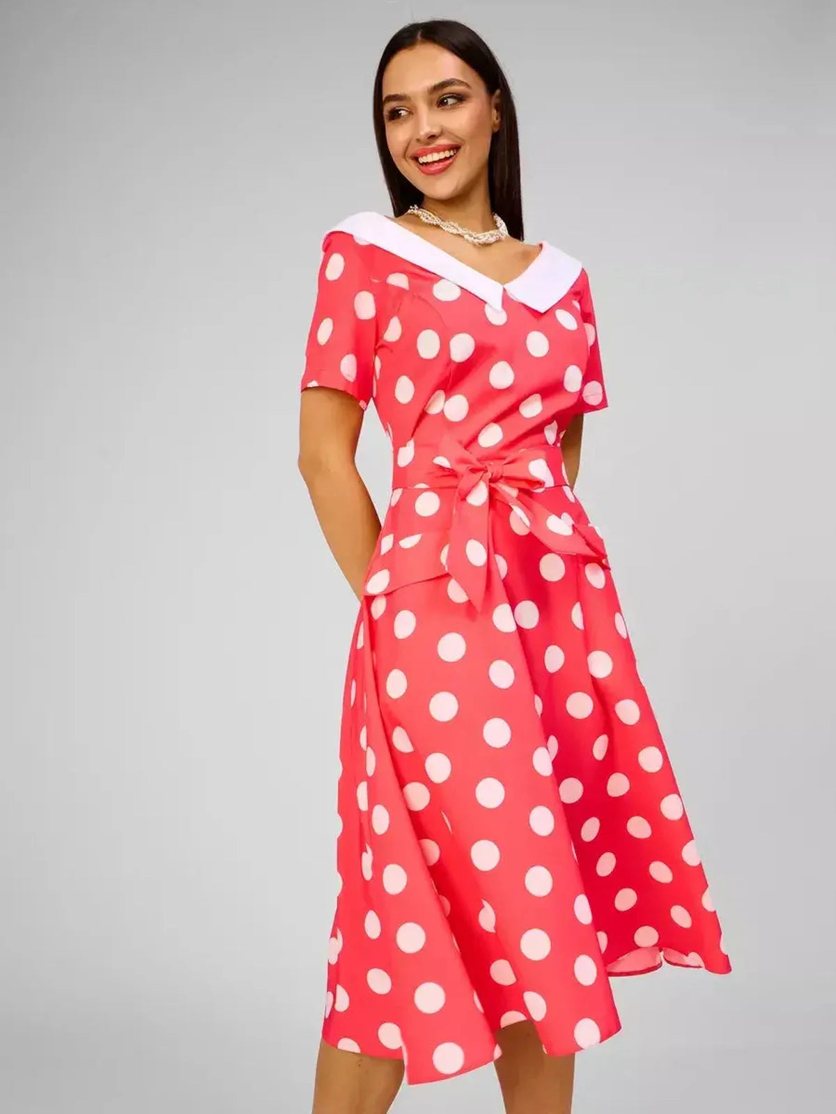 Sailor Chic Midi Dress in pink with polka dots and a white collar, perfect for summer wedding or cocktail events.