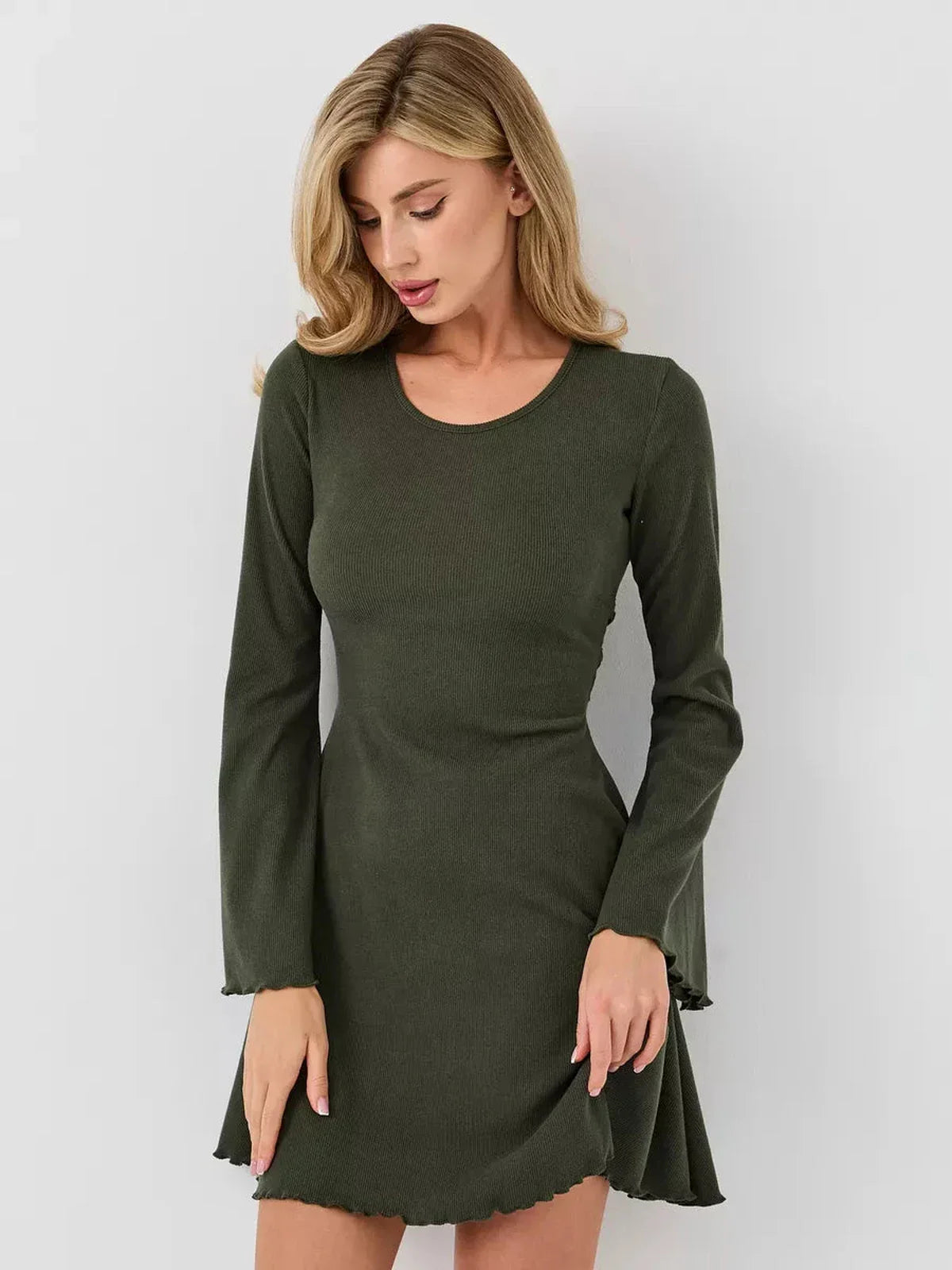 Sculpting Ivy Bell mini dress in olive green featuring flared bell sleeves and a flattering A-line silhouette.