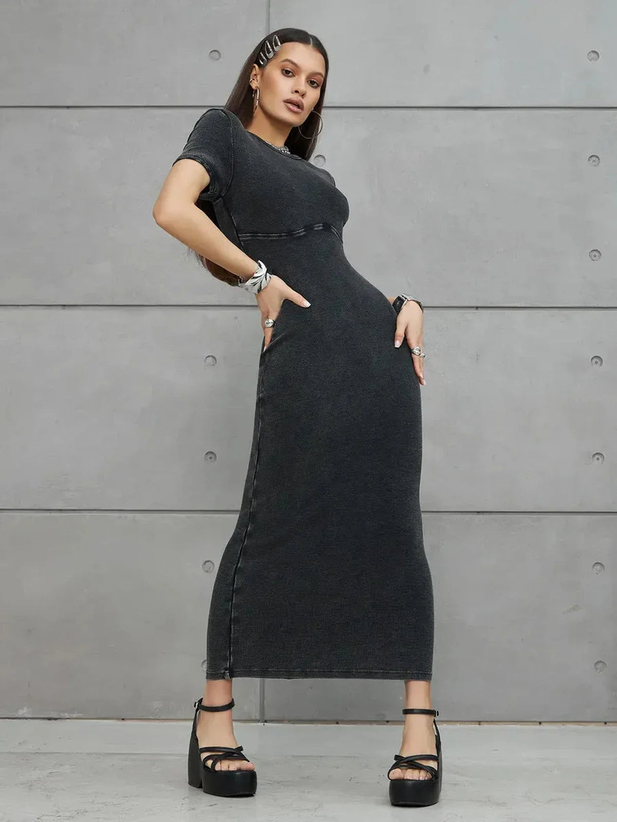 Graphite Form Maxi Dress on model showcasing sleek fit and urban style, perfect for summer or formal occasions.