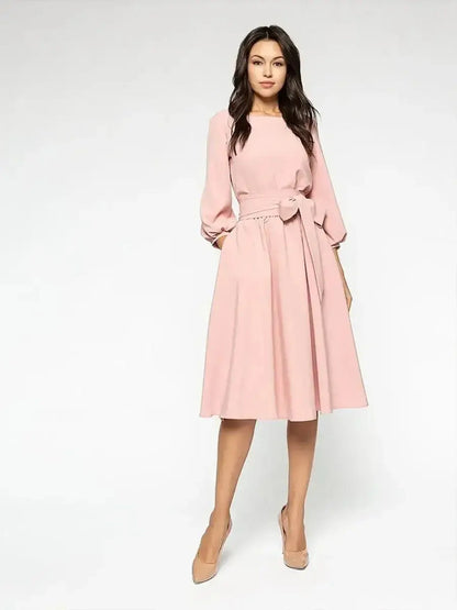 Blush Whisper Midi Dress featuring romantic puff sleeves and a wide waist belt, perfect for summer and formal occasions.