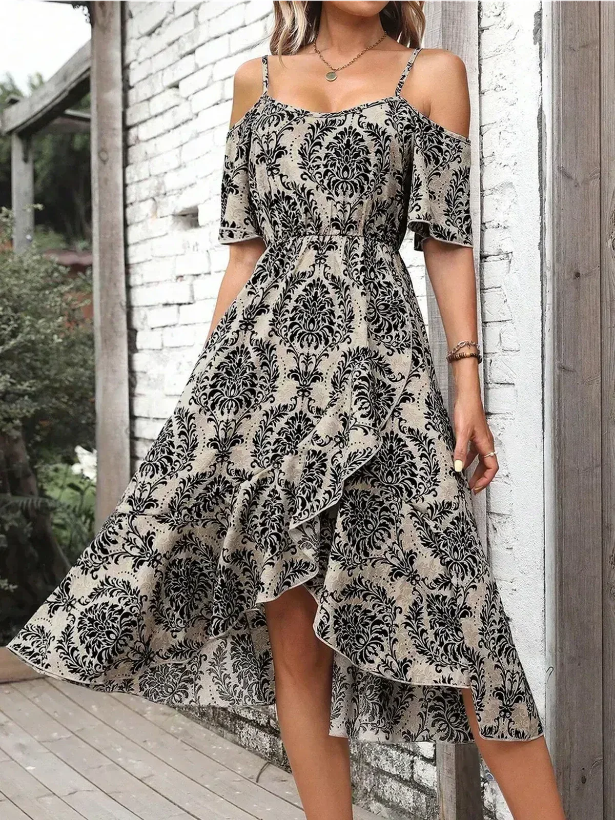 Boho Bloom Midi Dress featuring cold shoulder design and asymmetrical hem, perfect for summer elegance and special occasions.
