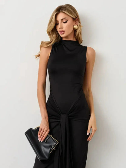 Sleek Obsidian Drape Maxi Dress featuring a high neckline and dramatic knotted detail, ideal for formal occasions.