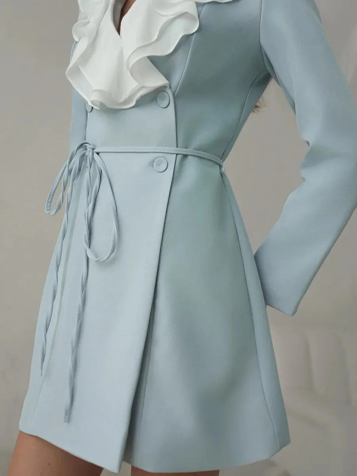 Celeste Ruffle Mini dress in sky blue featuring a V-neckline and cascading white ruffles, perfect for weddings or formal occasions.