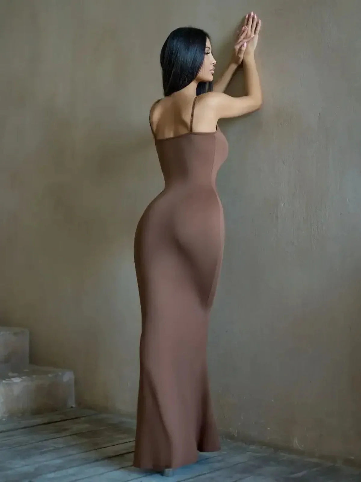 Cocoa Curve Maxi Dress in warm chocolate hue, showcasing a fitted silhouette perfect for summer and formal occasions.