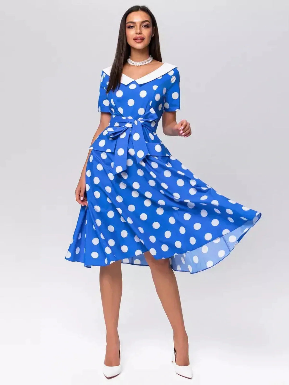 Women’s Midi Dress Azure Dots featuring a V-neckline, tie belt, and polka dot pattern, ideal for summer events.