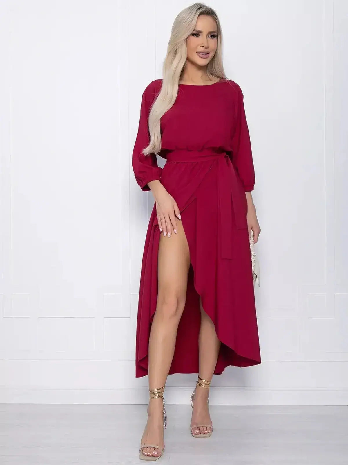 Crimson Allure Midi Dress in burgundy with a high-low hem and dramatic slit, perfect for weddings and summer soirées.