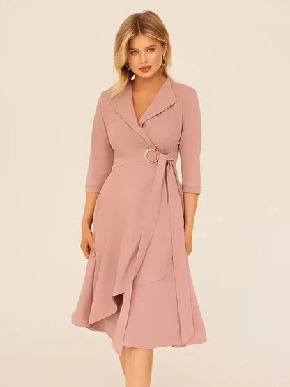 Stylish Blush Charm Midi Dress featuring a wrap silhouette and asymmetric hem, perfect for weddings and formal occasions.