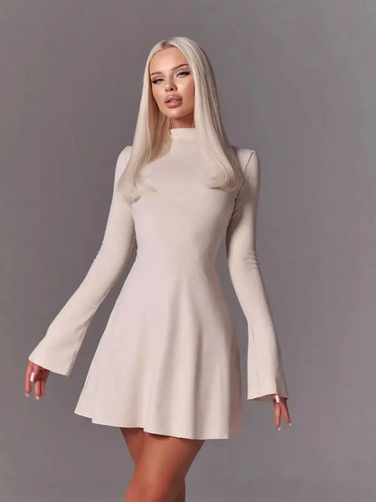 Ivory flare mini dress with bell sleeves, perfect for parties and weddings, showcasing modern minimalism and elegance.