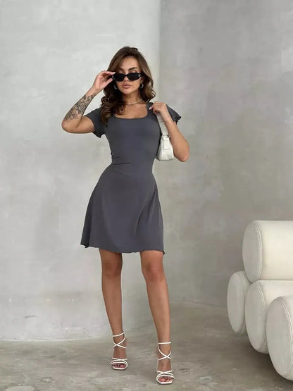 Slate Curve Mini Dress in sleek graphite, perfect for summer dresses, cocktail dresses, or any stylish occasion.