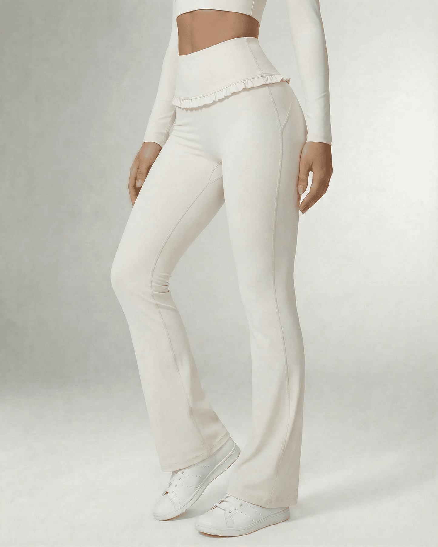 Celeste Leggings by Slimona - Elegant white flare pants with pockets and a flattering silhouette.