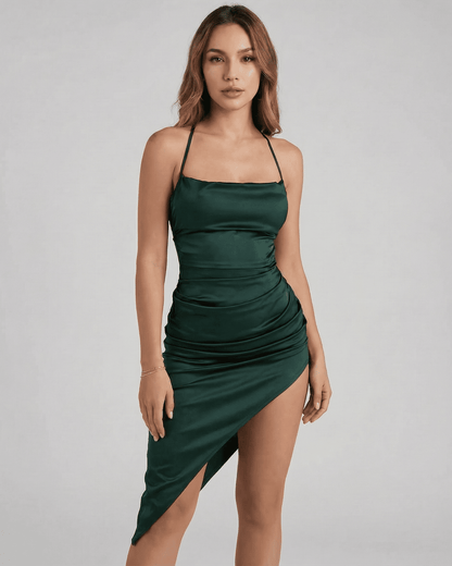 Selene Midi Dress by Slimona showcasing a sleek satin silhouette with elegant pleating in green.