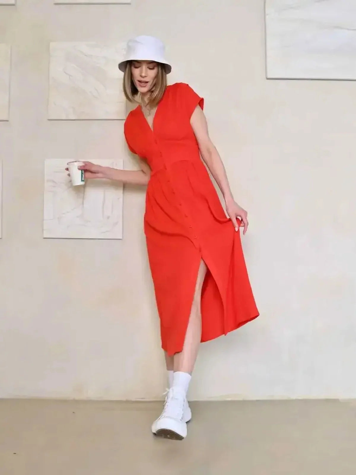 Effortlessly chic Flare Muse Midi Dress in radiant red, featuring a flattering V-neck and playful slit detail.