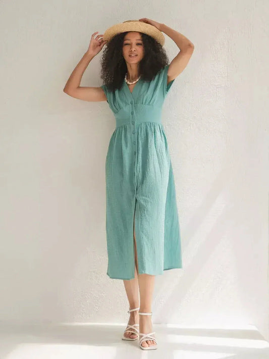 Veranda Midi Dress in sea-green, featuring a corset waist, perfect for summer outings or weddings.
