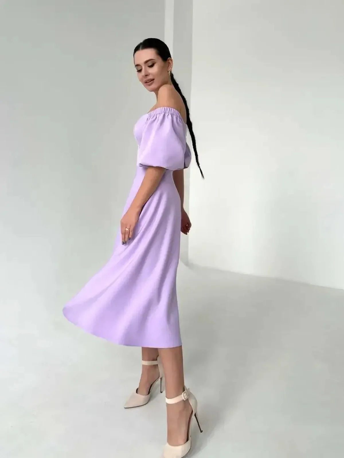 Lilac Grace Midi Dress featuring an elegant off-shoulder design, perfect for weddings, summer events, and special occasions.