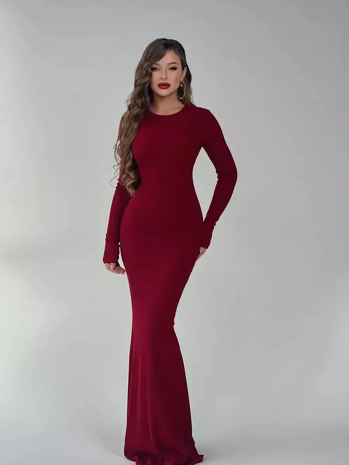 Elegant burgundy Velvet Ember Maxi Dress with long sleeves, perfect for weddings, proms, and formal events.