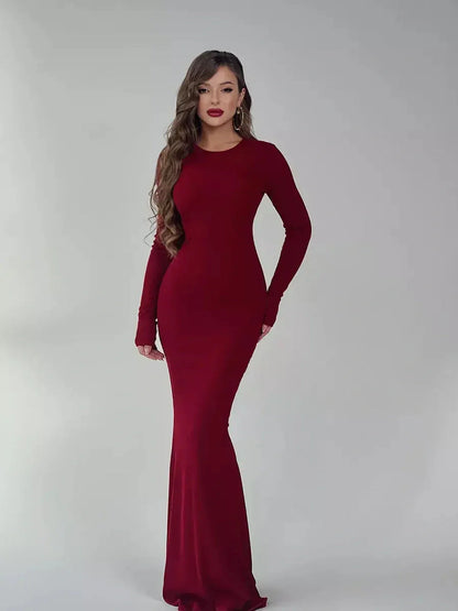 Elegant burgundy Velvet Ember Maxi Dress with long sleeves, perfect for weddings, proms, and formal events.
