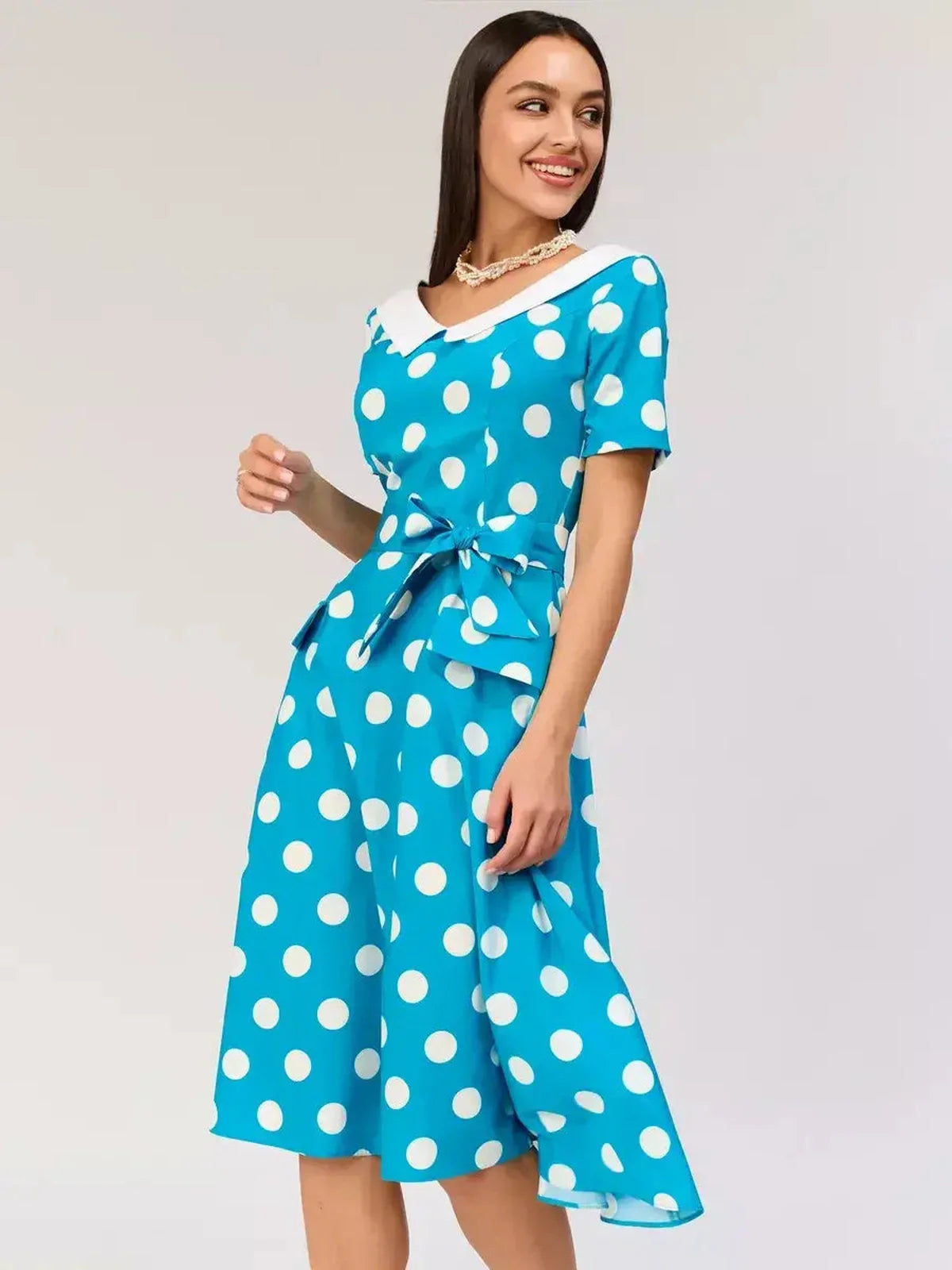 Retro Charm Midi Dress with polka dots and contrast collar, perfect for weddings and summer events.