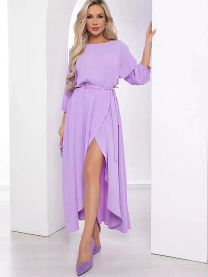 Luxe lilac midi dress featuring cutout sleeves and belted waist, perfect for weddings and formal occasions.
