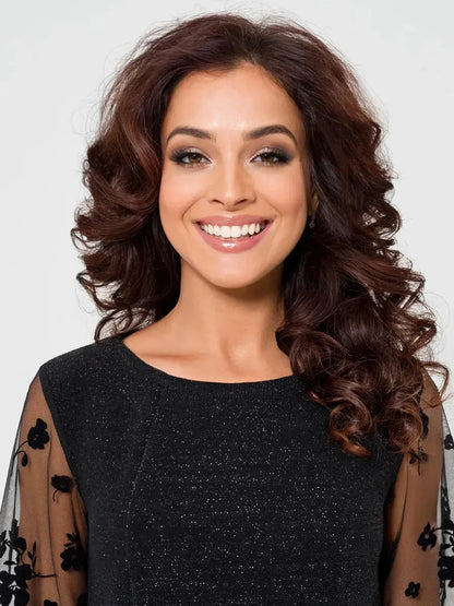 Smiling model showcasing the Luxe Spark Midi Dress with sheer sleeves and elegant black lurex fabric.