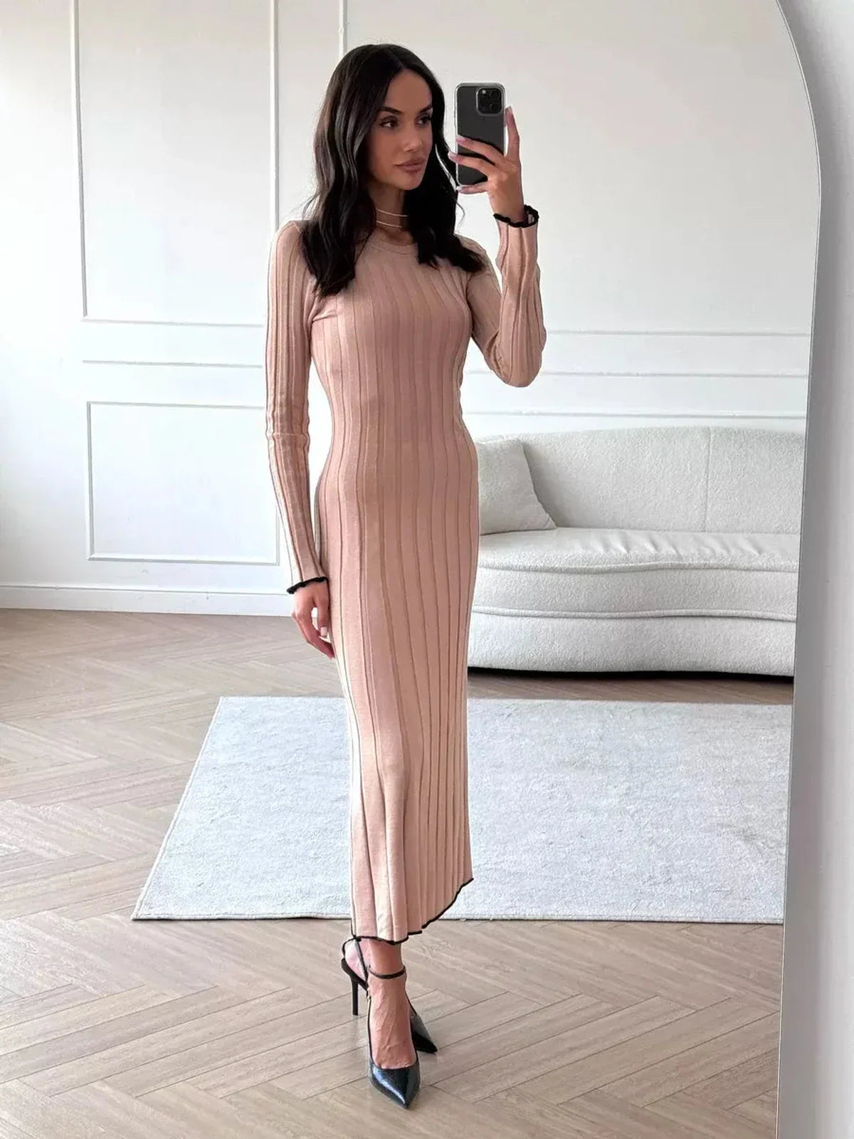 Model showcasing the Sahara Curve Maxi Dress in sandstone beige, perfect for weddings, formal events, and summer outings.
