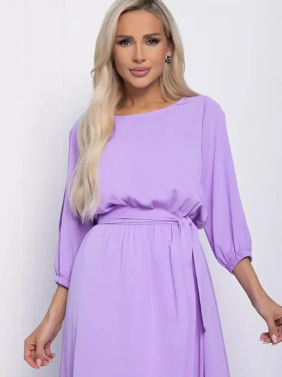 Elegant lilac midi dress with shoulder cutouts, perfect for summer occasions and stylish events.