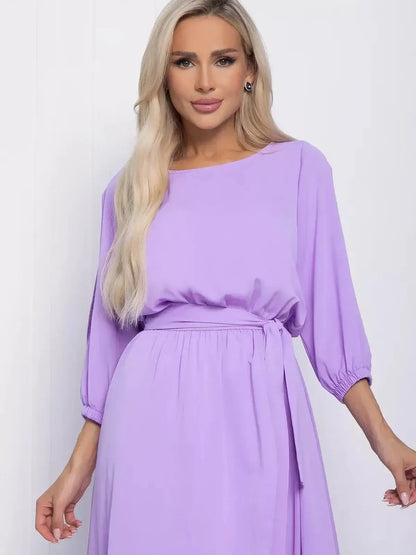 Elegant lilac midi dress with shoulder cutouts, perfect for summer occasions and stylish events.
