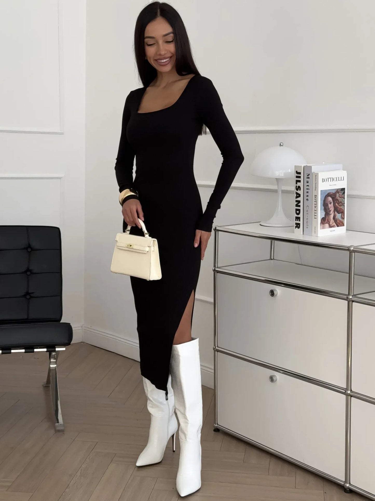 Sleek black Contour Midi Dress featuring a square neckline and thigh-high slit, perfect for summer and formal occasions.