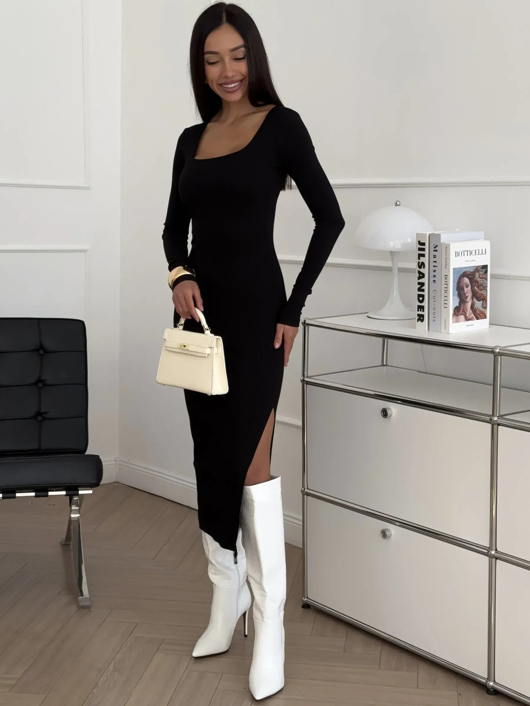 Sleek black Contour Midi Dress featuring a square neckline and thigh-high slit, perfect for summer and formal occasions.