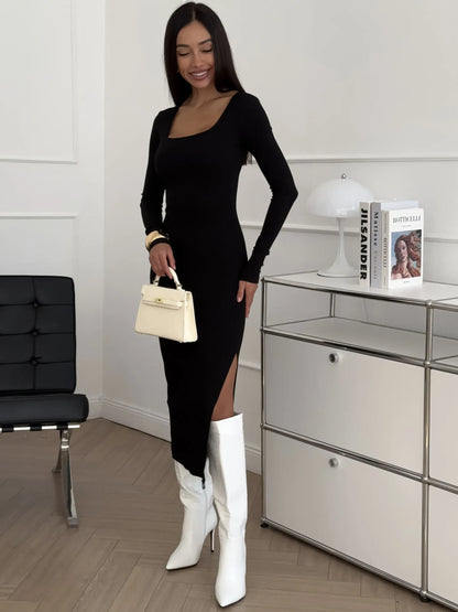 Sleek black Contour Midi Dress featuring a square neckline and thigh-high slit, perfect for summer and formal occasions.