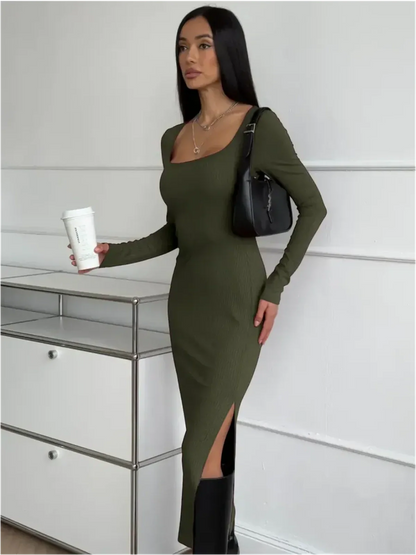 Model wearing the Verona Midi Dress in khaki with a side slit, perfect for summer or formal occasions.