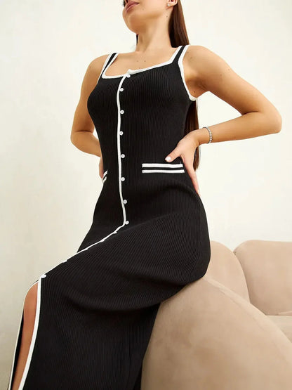 Elegant black midi dress with contrast piping and decorative buttons, perfect for formal occasions and summer outings.