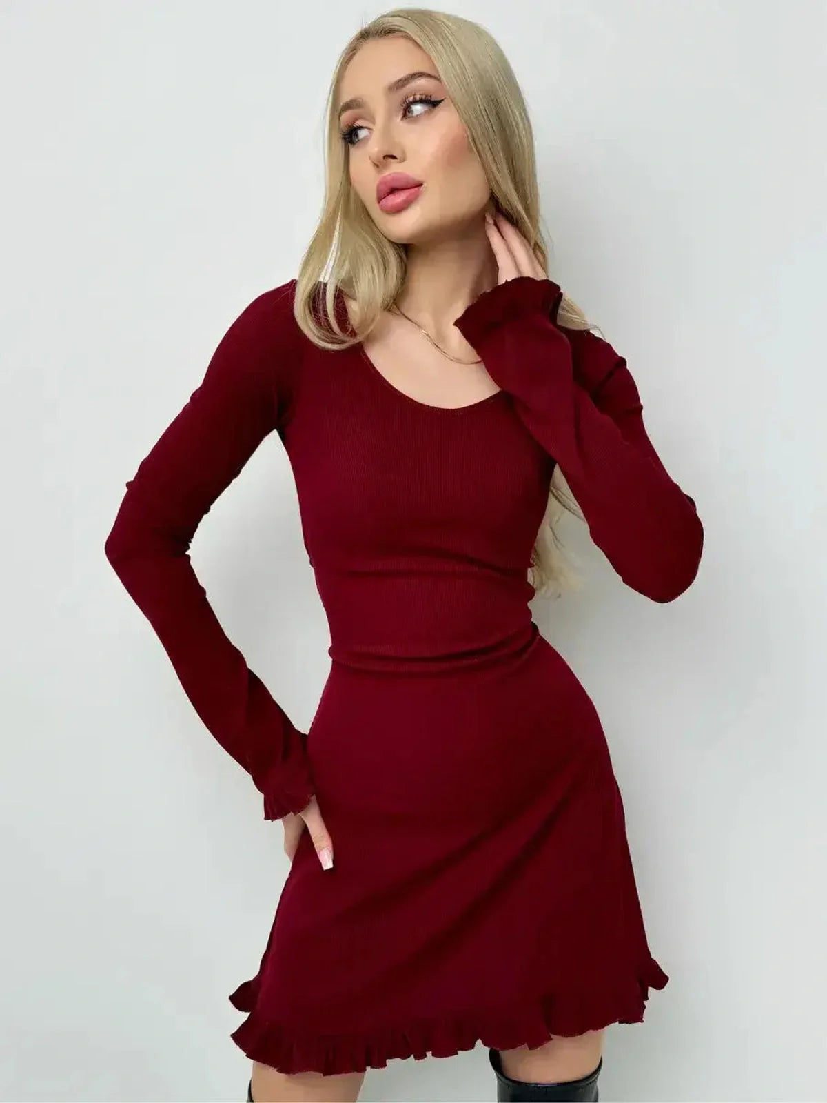 Crimson Flare red mini dress featuring romantic ruffles and a fitted silhouette, perfect for weddings and casual events.