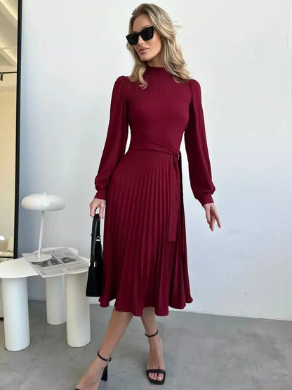 Crimson Grace Midi Dress featuring statement pleats and a sculpted knit design, perfect for formal occasions and weddings.