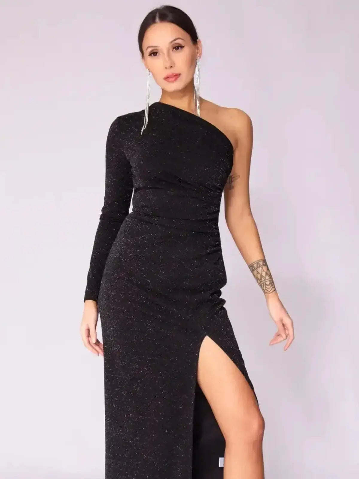 Luna Noir Maxi Dress, one-shoulder black dress with a daring leg slit, perfect for formal occasions and weddings.