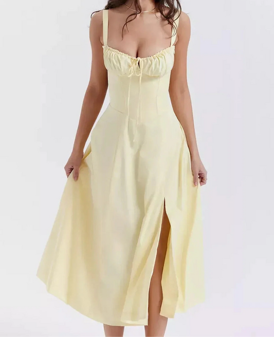 Sunlace Midi Dress in soft yellow featuring a corset detail, perfect for summer weddings, proms, or cocktail events.
