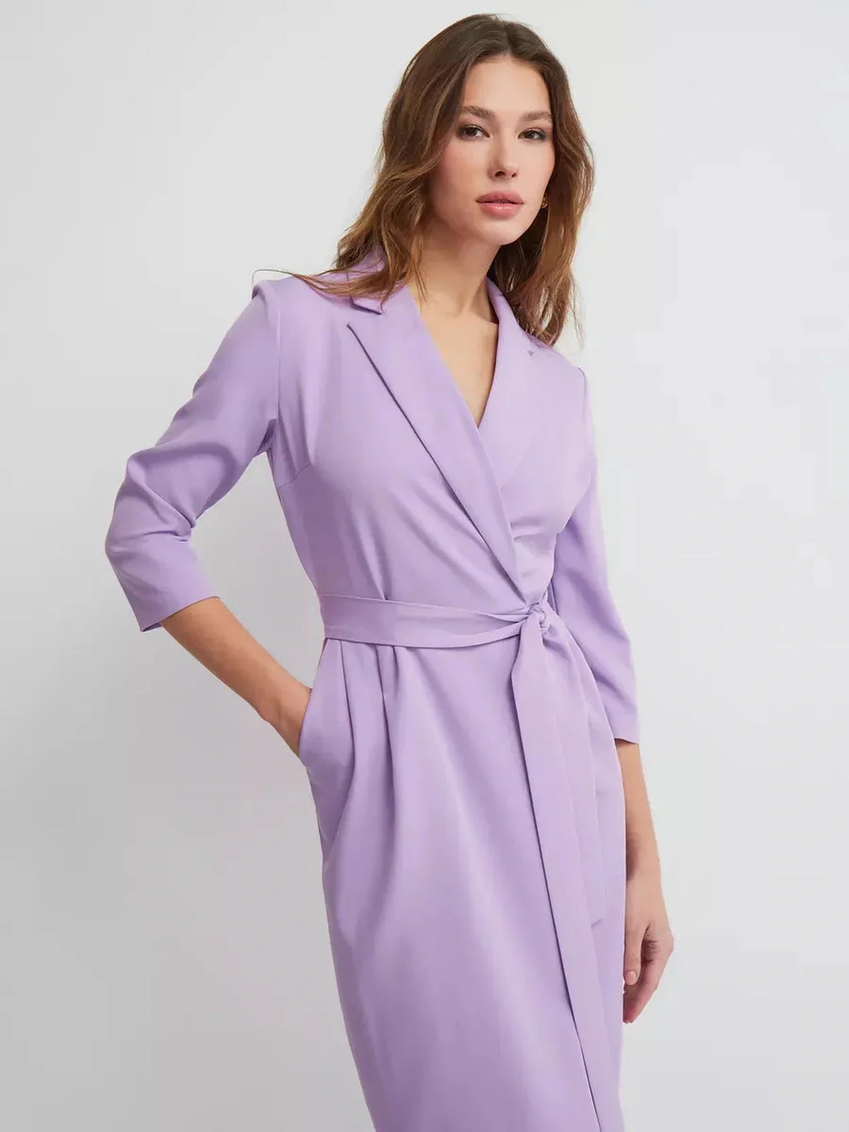 Lilac Grace Midi Dress showcasing tailored wrap design, perfect for formal occasions, weddings, and summer events.