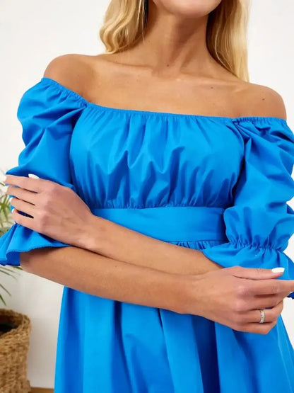 Off-the-shoulder vibrant blue dress with puffed sleeves, perfect for summer events and special occasions.