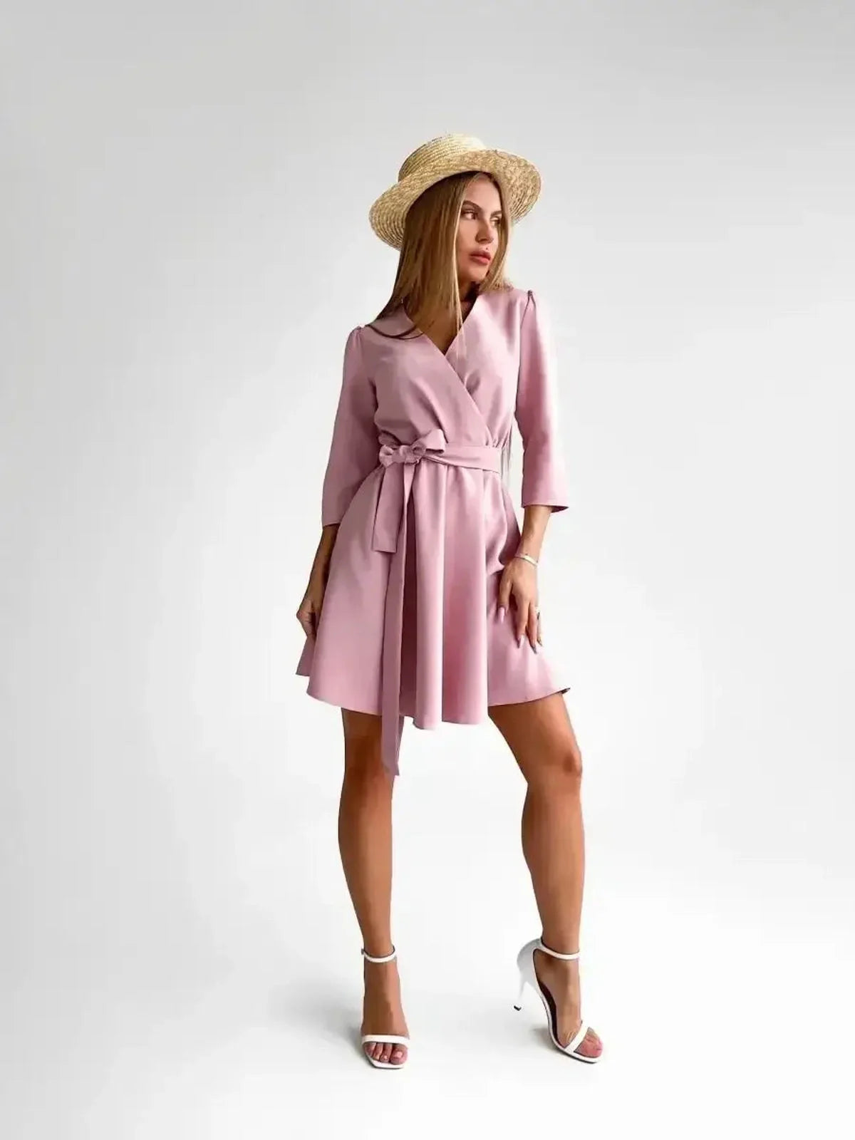 Sophisticated pink mini dress with a tie belt, perfect for weddings, proms, and summer occasions.