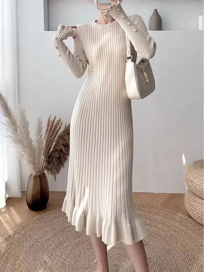 Pearl flare midi dress with ribbed texture and pearl buttons, perfect for weddings, graduations, and formal events.