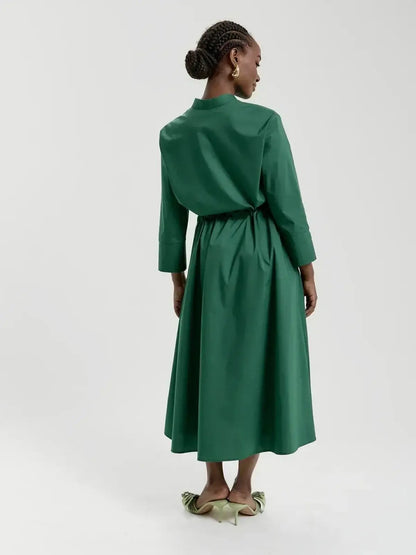 Emerald Ease Midi Dress in green, featuring a polished shirt style, cinched waist, and elegant silhouette.