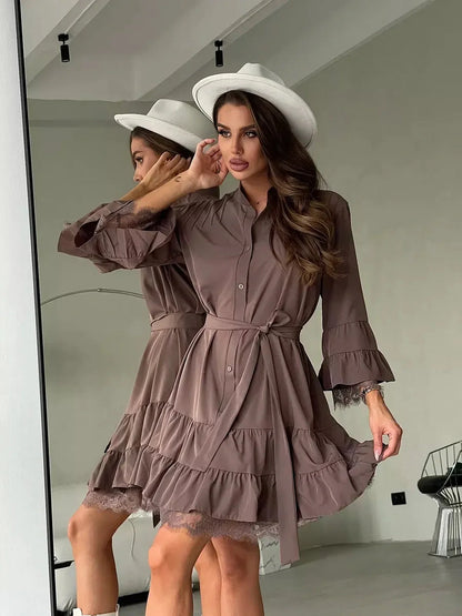 Chocolate brown lace trim mini dress with tiered ruffles and tie belt, perfect for weddings or summer events.
