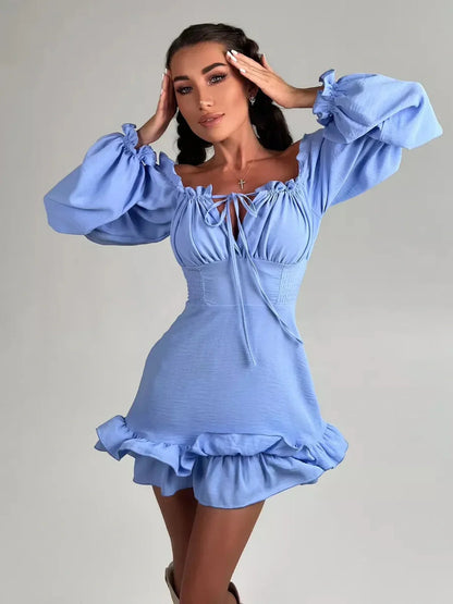 Sky-blue Boho Frill Mini Dress with off-shoulder neckline and romantic ruffles, perfect for summer celebrations.