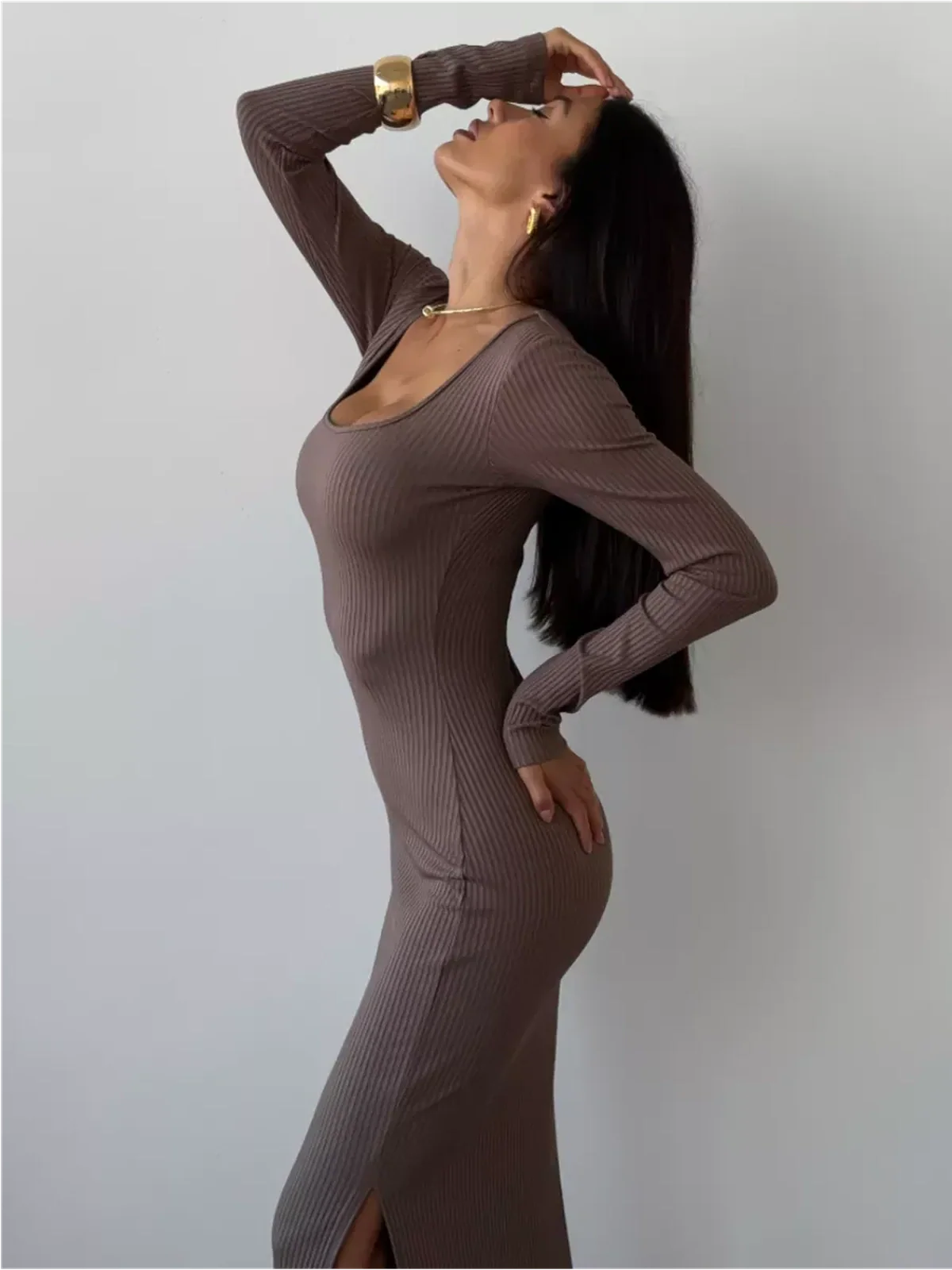 Elegant woman modeling a ribbed Contour Midi Dress with a sleek silhouette and square neckline, ideal for special occasions.