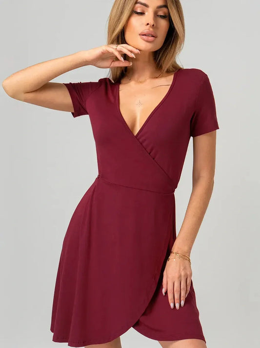 Deep red Wrap Hour Mini Dress featuring a V-neckline and adjustable tie waist, perfect for summer and evening events.