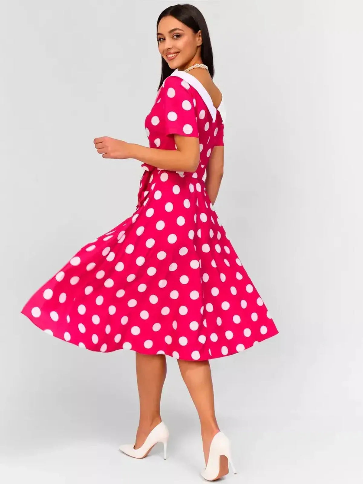 Monaco Charm Midi Dress in pink polka dots with white collar, perfect for weddings or special occasions.
