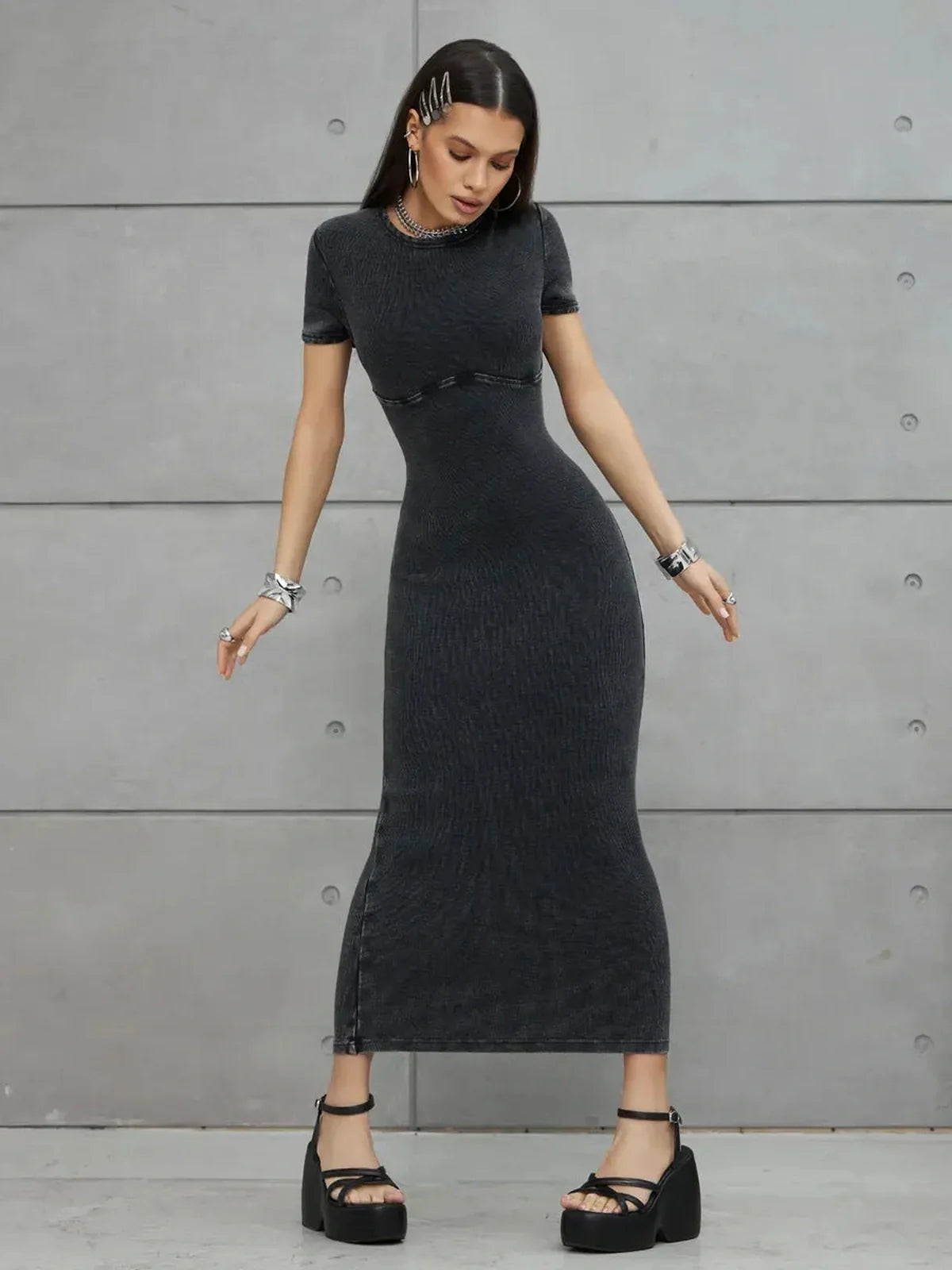 Graphite Form Maxi Dress showcasing sleek fit and urban style, ideal as a summer dress or wedding guest attire.