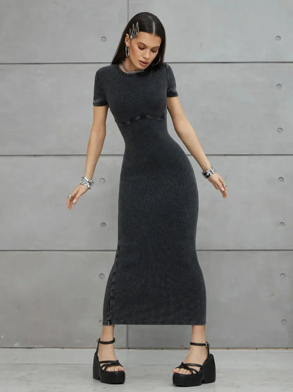 Graphite Form Maxi Dress showcasing sleek fit and urban style, ideal as a summer dress or wedding guest attire.